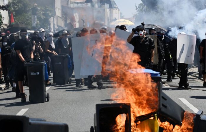 In western France, clashes with police broke out at a protest rally.