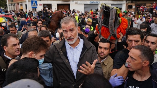 The King of Spain interrupted his visit to flood-affected areas.